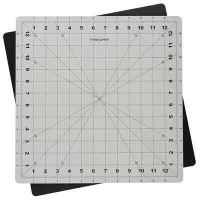 Image of Fiskars Cutting Mat: Rotating: 33 x 33cm Self Healing rotates 360 degrees 30, 45 and 60 bias Lines