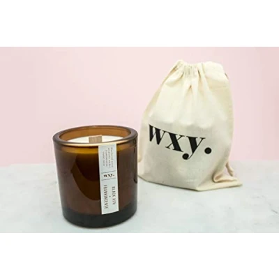 Image of WXY. Big Amber Candle Black Ash &amp; Frankincense