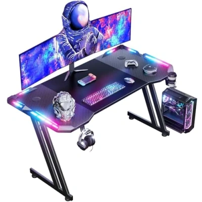 Image of DLONGONE 140 x 60cm RGB Gaming Desk, Large Table for Laptop, Home Office Desk with Carbon Fiber Coated, PC Headphone Hook and Cup Holder, Easy to Assemble, Black