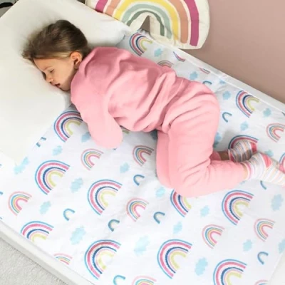 Image of Hygge Sheets® Potty Training Bed Pads 2Pack 100% Waterproof Wetting Sheets for Single and Toddler Beds Non Slip, Easy to Change at Night Includes Free E Book UK Brand Rainbow
