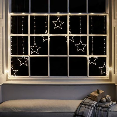 Image of Lights4fun Christmas Indoor Star Curtain Window Light Decoration with 258 Warm White Micro LEDs Plug in 1.2m x1.2m