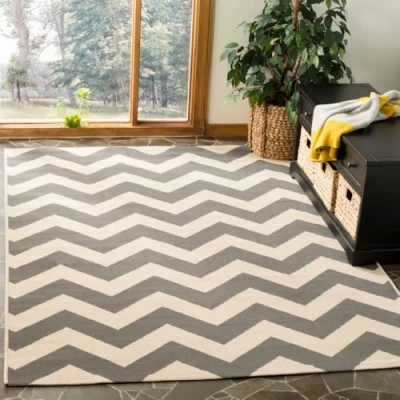 Image of SAFAVIEH Chevron Rug for Indoor &amp; Outdoor Courtyard Collection, Short Pile, in Grey and Beige color, 122 X 170 cm