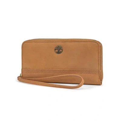 Image of Timberland Women&#039;s Leather RFID Zip Around Wallet Clutch with Wristlet Strap, Wheat (Nubuck), One size