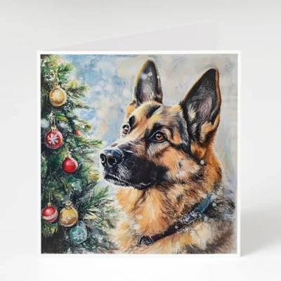 Image of German Shepherd Christmas Cards Pack of 5 next to a tree. Printed on 300gsm card
