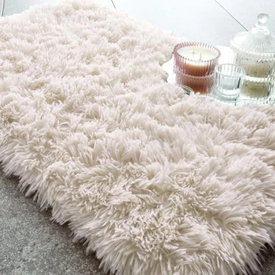 Image of Catherine Lansfield Cuddly Deep Pile Faux Fur Bath Mat, 50x80 cm, Cream