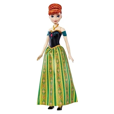 Image of Mattel Disney Frozen Singing Anna Doll, in Signature Clothing, Button Sings &quot;For the First Time Forever&quot; Song, Toys for Ages 3 and Up, Spanish Version, HMG43