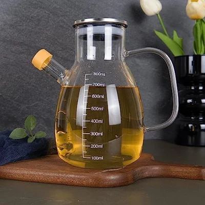 Image of Eden &amp; Willow Glass Olive Oil Bottle, Vinegar Cruet Bottle with Non Drip Spout Kitchen Cooking Dispenser Drizzler Stainless Steel Lid and Handle (550ml)