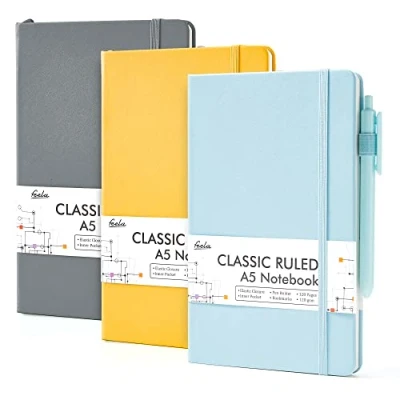 Image of feela A5 Notebooks Multipack, 3 Pack Ruled Lined Notepads (120 GSM), Hardback Journal Notebook with Black Gel Pens, 128 Pages/Pack, 21 x 13cm, Solid Colours, Grey, Yellow, Light Blue