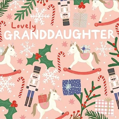 Image of Woodmansterne Lovely Granddaughter Christmas Card Rocking Horse, Nutcracker and Holly Eco Friendly Recyclable