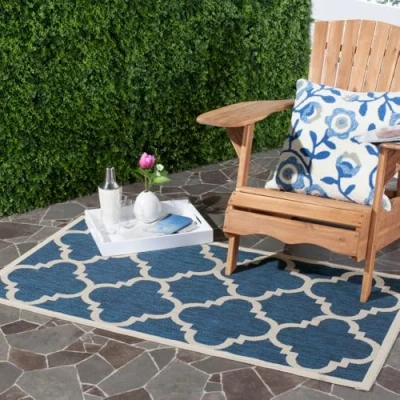 Image of SAFAVIEH Trellis Rug for Indoor &amp; Outdoor Courtyard Collection, Short Pile, in Navy and Beige color, 79 X 152 cm