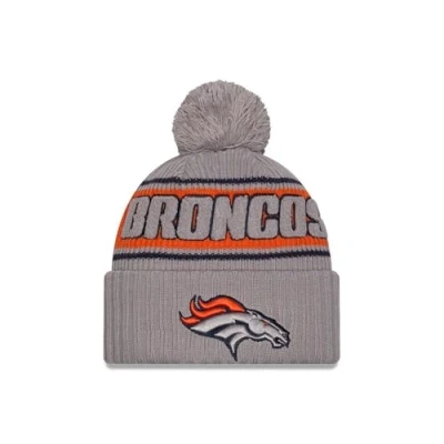 Image of New Era Denver Broncos NFL 2024 Sideline Sport Knit Grey Bobble Hat