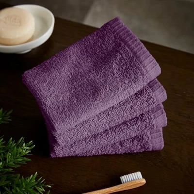 Image of Catherine Lansfield Quick Dry Cotton 30x30 cm 4 Pack Face Cloths Plum