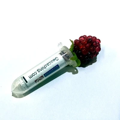 Image of AllCachedUp Life Sized Raspberry Geocache Geocaching Sneaky Container on Tube