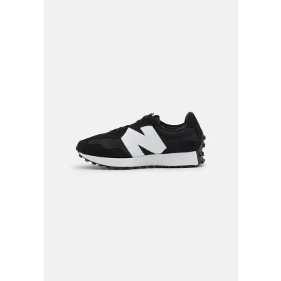 Image of New Balance 327 women&#039;s Shoes (Trainers) in Black