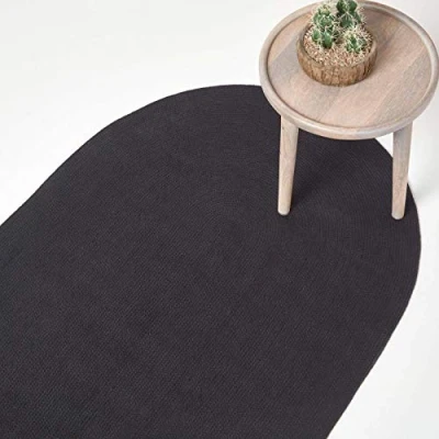 Image of HOMESCAPES Black Handmade Braided Oval Rug For Bedroom &amp; Living Room Reversible Woven Cotton Small Rug, 60 x 90 cm