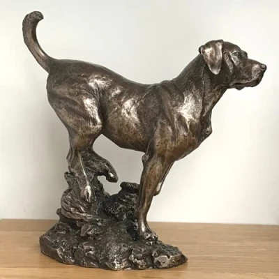 Image of Animal Crackers Labrador figurine on rocks, cast in heavy weight cold bronze, fabulous quality sculpture designed by David Geenty, boxed