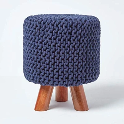Image of HOMESCAPES Navy Blue Cotton Knitted Pouffe Footstool with Wooden Legs 32 x 42 cm