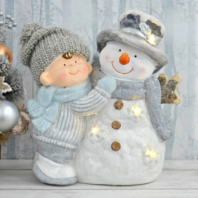 Image of Mr Crimbo Christmas Decoration Light Up Ceramic Snowman Child Figure Knitted Hat 37cm Boy