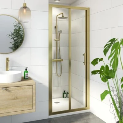 Image of Luxura® 900mm Bifold Folding Shower Door for Wet Room Cubicle Enclosures, 6mm Toughened Safety Glass Space Saving, Framed, Brushed Brass