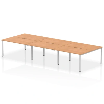 Image of Evolve B2B Silver Frame Bench Desk 1400 Oak (6 Pod) BE295