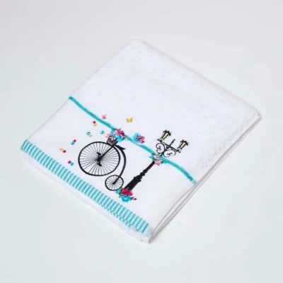 Image of HOMESCAPES 100% Turkish Cotton &#039;Vintage Bike&#039; White Hand Towel Black Silhouette Bike and Flowers