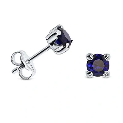 Image of Miore 4 prong earrings for women in 9 kt 375 white gold with blue sapphire
