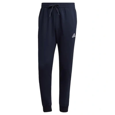 Image of adidas Sportswear Essentials Tapered Tracksuit bottoms, Men&#039;s, Size: Large, Legend ink/white