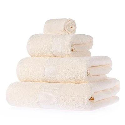 Image of HOMESCAPES Cream Turkish Cotton 4 Piece Towel Set Soft &amp; Absorbent 500 GSM Heavyweight Face Cloth, Hand Towel, Bath Sheet Bale