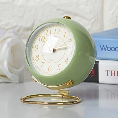 Image of Justup 4 inch analogue alarm clock, small quiet table classic retro clock with no ticking, night light, silent, battery powered, HD glass for interior decoration, kitchen, bedroom Green