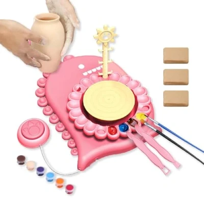 Image of Coo11 Kids Rechargeable Pottery Wheel Kit for Kids, Dinosaur Studio with Foot Pedal, Rotating Plate, Sculpting Tools, Paints, Brushes &amp; Apron, Electric DIY Arts Crafts Set (Pink)
