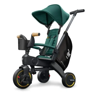 Image of DOONA Liki Baby Trike S5 Deluxe Foldable Toddler Tricycle with parent handle for ages 10 Months to 3 Years Racing Green