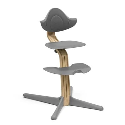 Image of Stokke Nomi Chair, Oak/Grey Inspires Active Sitting Tool Free, Seamless Adjustability Includes Stable Footrest &amp; Anti Tilt Wheels Holds Up to 150 kg