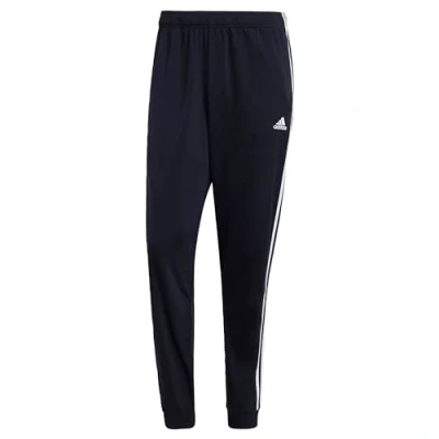 Image of adidas Essentials Men&#039;s Pants (1/1) Warm Up Tapered 3 Stripes Tracksuit Bottoms, Legend Ink/White, H46106, XS