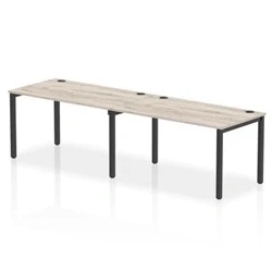 Image of Impulse Bench Single Row 2 Person 1400 Black Frame Desk Grey Oak