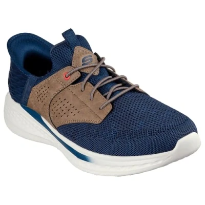 Image of Skechers USA Men&#039;s Slade Caster Sneaker, Navy/Tan, 10.5