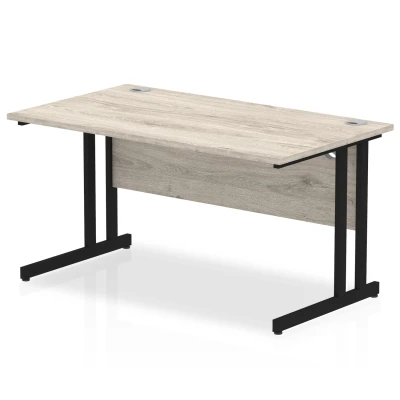 Image of Impulse 1400 x 800mm Straight Desk Grey Oak Top Black Cantilever Leg