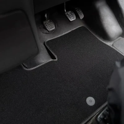 Image of Carpet Floor Mats for the Ford Transit Courier (2014 2019) Custom Van Accessory Tailored fit, Granulated Anti Slip Layer &amp; Grey Binding