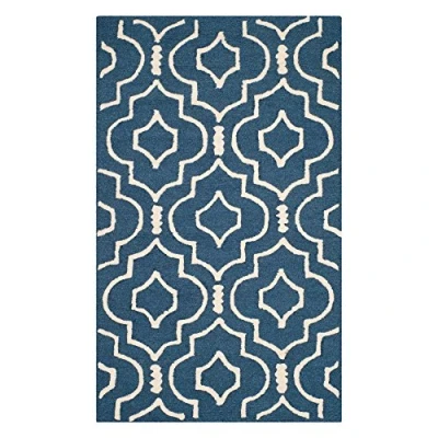 Image of SAFAVIEH Modern Rug for Living Room, Dining Bedroom Cambridge Collection, Short Pile, in Navy Blue and Ivory, 91 X 152 cm