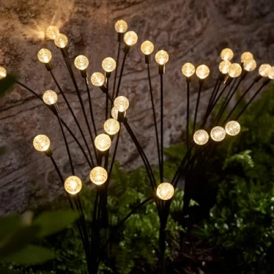 Image of Lights4fun Set of 4 Solar Powered LED Wavy Bubble Garden Pathway Decorative Stake Lights Outdoor IP44 Rated