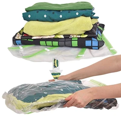 Image of The Chestnut V 8 Space Saver Vacuum or Pump Needed Storage Clothes Reusable Packing Sacks Travel Accessories Luggage Compression Bags, Transparent and Green with a White Clip