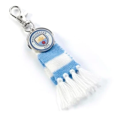 Image of The Carat Shop Manchester City Football Club Blue Scarf and Logo Charm Backpack Hanger