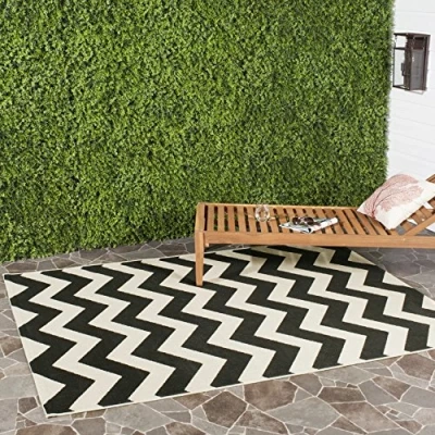 Image of SAFAVIEH Trellis Rug for Indoor &amp; Outdoor Courtyard Collection, Short Pile, in Black and Beige color, 160 X 231 cm