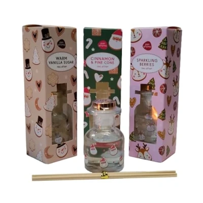 Image of Shop4allsorts Christmas reed diffuser set 3 fragrance cinnamon and pine cone warm vanilla sugar sparkling berries oil 50ml home diffusers festive scents.
