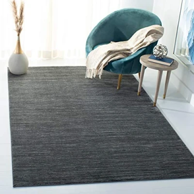 Image of SAFAVIEH Glam Solid Color Rug for Living Room, Dining Bedroom Vision Collection, Short Pile, in Grey, 122 X 183 cm