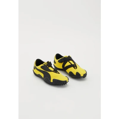 Image of Puma Mostro OG Prime Unisex Trainers, Size: 3.5, Yellow/black shoes