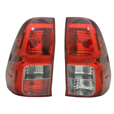 Image of 815500K260, 815510K260 Rear light TYC 11 12961 15 2 Right with bulb holder TOYOTA: Hilux VIII Pickup