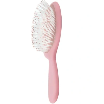 Image of Incredilox Detangling Brush. Say goodbye to knots and tangles. Effortlessly glides through all hair types without tugging or pulling. Cruelty Free. Vegan Friendly.