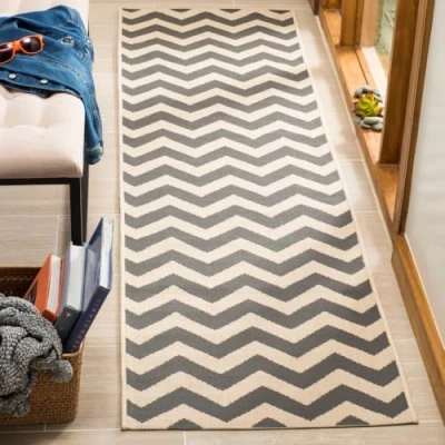 Image of SAFAVIEH Chevron Rug for Indoor &amp; Outdoor Courtyard Collection, Short Pile, in Grey and Beige color, 69 X 244 cm