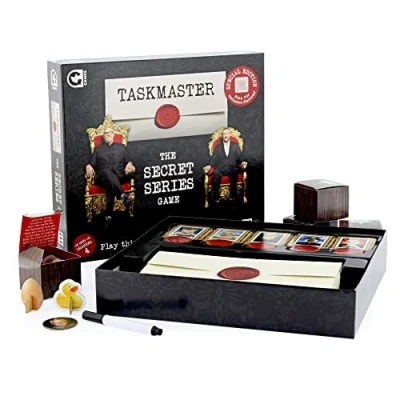 Image of Ginger Fox Taskmaster Secret Series Board Game Special Edition Ultimate Family Fun Hilarious Challenges with Silly Video Tasks from Alex Horne Ideal for Parties and Groups Ages 8+ Years