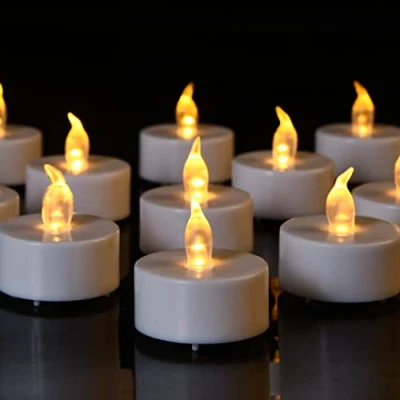 Image of HANZIM Tea Lights, 50 Pack Flameless LED Light Candles 100 Hours Realistic Flickering Bulb Battery Operated Lights Seasonal &amp; Festival Celebration Electric Fake Candle in Warm Yellow